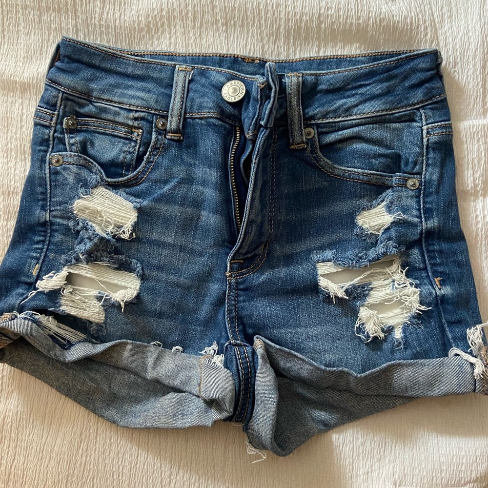 American Eagle distressed medium wash denim shorts size 2